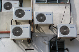 Air conditioners Kota Bharu Malaysia. Credit: Andrew Woodley/Education Images/Universal Images Group via Getty Images