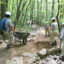 Americorps National Civilian Community Corps team working on trail maintenance and construction at Hawk Mountain. Credit: Tim Leedy/MediaNews Group/Reading Eagle via Getty Images