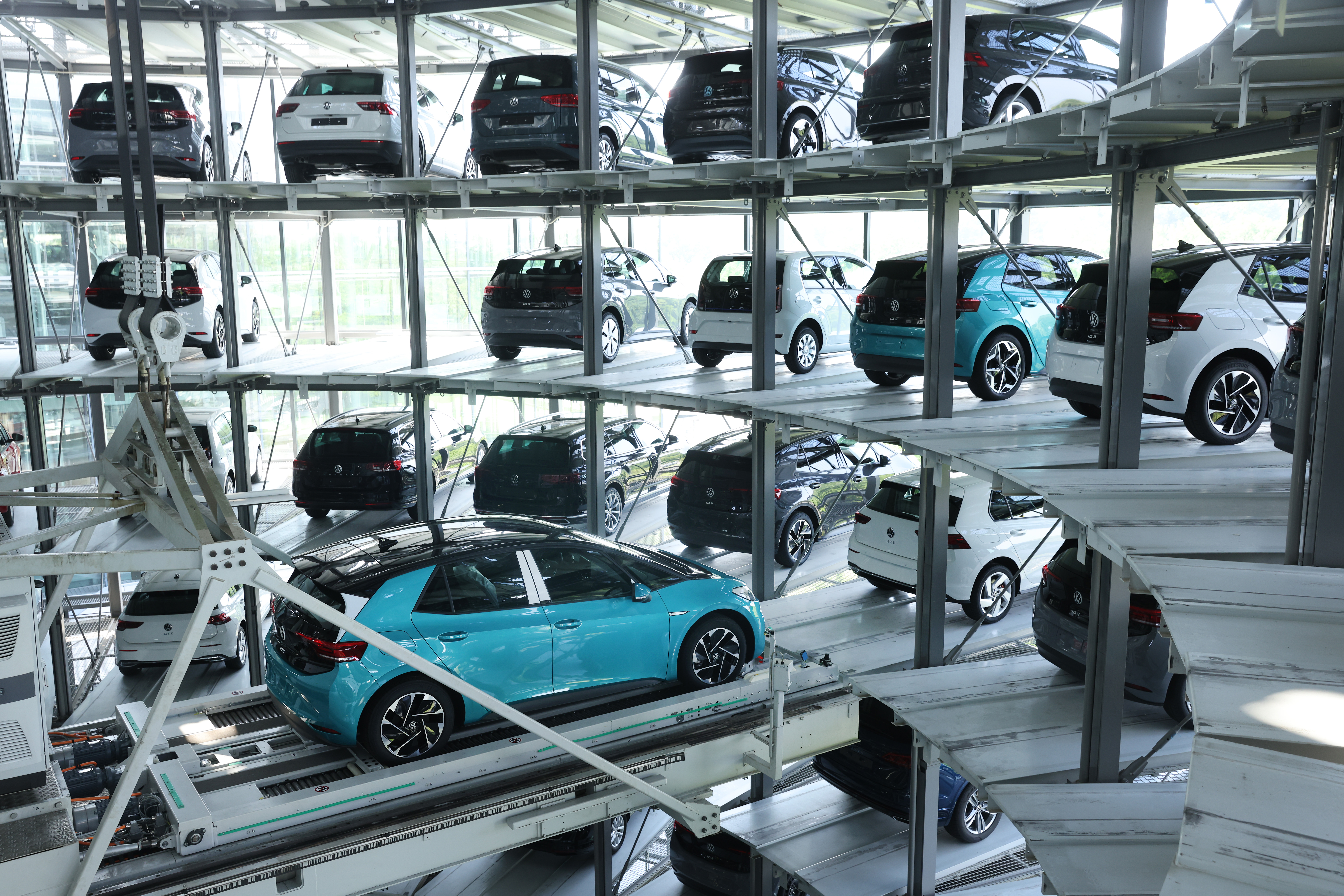 Volkswagen ID.3 electric cars in a storage tower.