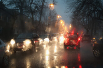 Motorists navigate streets during a heavy rainfall on April 18, 2013 in Chicago, as thunderstorms dumped up to 5 inches of rain on parts of city.