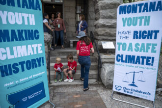 Supporters gather at a theater next to the court house in Helena Montana to watch the court proceedings for the nation's first youth climate change trial in June 2023. Sixteen plaintiffs, ranging in age from 6 to 22, are suing the state for promoting fossil fuel energy policies that they say violate their constitutional right to a "clean and healthful environment." Credit: William Campbell/Getty Images.