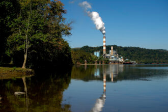 A plume of exhaust extends from the Mitchell Power Station, a coal-fired power plant built along the Monongahela River, 20 miles southwest of Pittsburgh, on Sept. 24, 2013 in New Eagle, Pennsylvania. Credit: Jeff Swensen/Getty Images