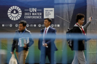 People walk inside UN headquarters, ahead the UN Water Conference, on March 22, 2023, in New York City. Credit: Leonardo Munoz/AFP via Getty Images